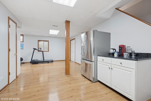 42 N Holly Ave, Fox Lake, IL 60020 - kitchen featuring stainless steel fridge with ice dispenser, white cabinets, light wood-style flooring, and a paneled ceiling