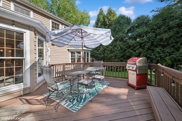 42 N Holly Ave, Fox Lake, IL 60020 - wooden deck with outdoor dining space and area for grilling