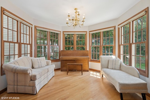 42 N Holly Ave, Fox Lake, IL 60020 - sunroom featuring a chandelier, healthy amount of natural light, and french doors
