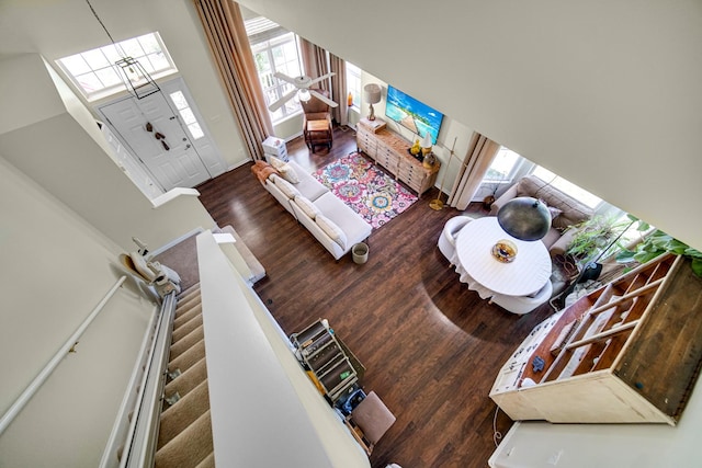 361 Cascade Ln Unit 1, Oswego, IL 60543 - living area with wood finished floors and a towering ceiling