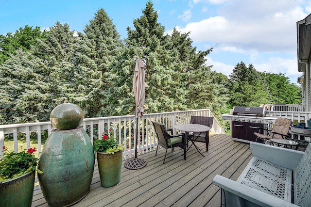 361 Cascade Ln Unit 1, Oswego, IL 60543 - deck featuring outdoor dining space and a grill