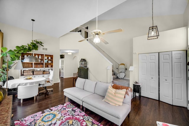 361 Cascade Ln Unit 1, Oswego, IL 60543 - living area with high vaulted ceiling, wood finished floors, a ceiling fan, and stairway