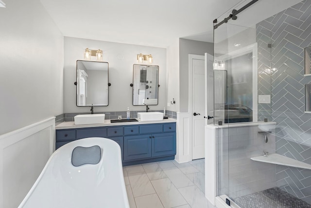 1401 Fallcreek Ct, Naperville, IL 60565 - full bathroom featuring a shower stall, marble finish flooring, double vanity, wainscoting, and a freestanding bath