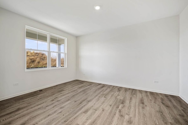 15030 W Oxford Ln, Manhattan, IL 60442 - unfurnished room with wood finished floors and baseboards