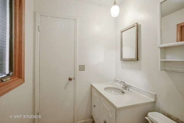 236 Brighton Rd, Elk Grove Village, IL 60007 - half bathroom with vanity and toilet
