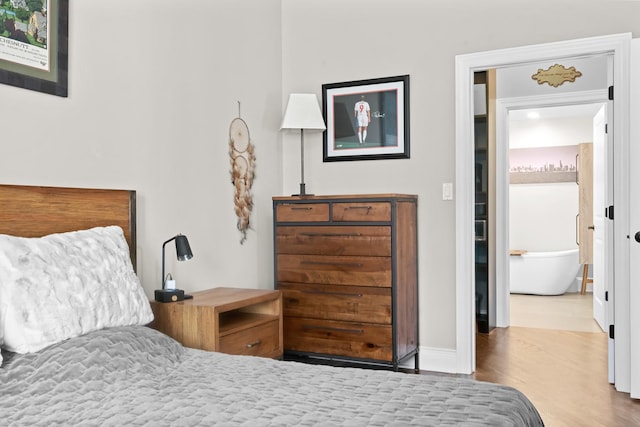841 W Monroe St Unit 4A, Chicago, IL 60607 - bedroom featuring wood finished floors and baseboards