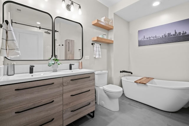 841 W Monroe St Unit 4A, Chicago, IL 60607 - bathroom featuring double vanity, a freestanding bath, tile patterned flooring, and a shower