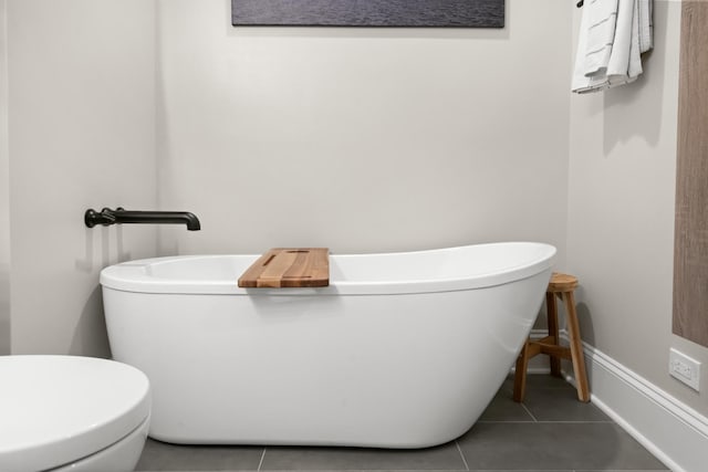 841 W Monroe St Unit 4A, Chicago, IL 60607 - full bath with a freestanding bath and tile patterned flooring
