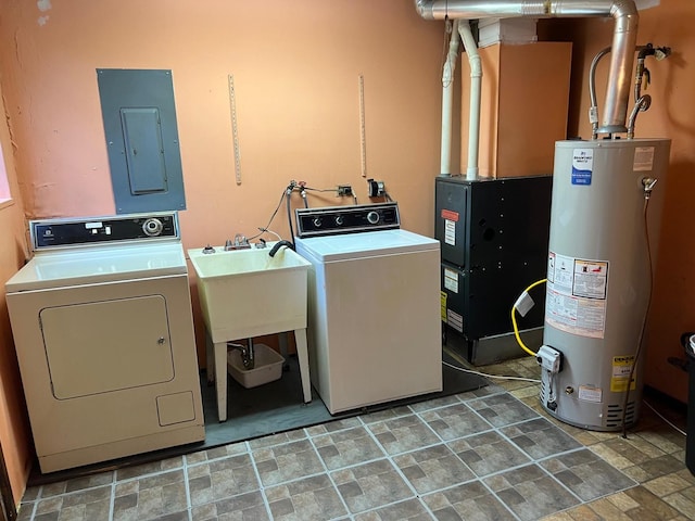 2075 Halsey Dr, Des Plaines, IL 60018 - washroom featuring water heater, electric panel, washing machine and clothes dryer, stone finish flooring, and heating unit