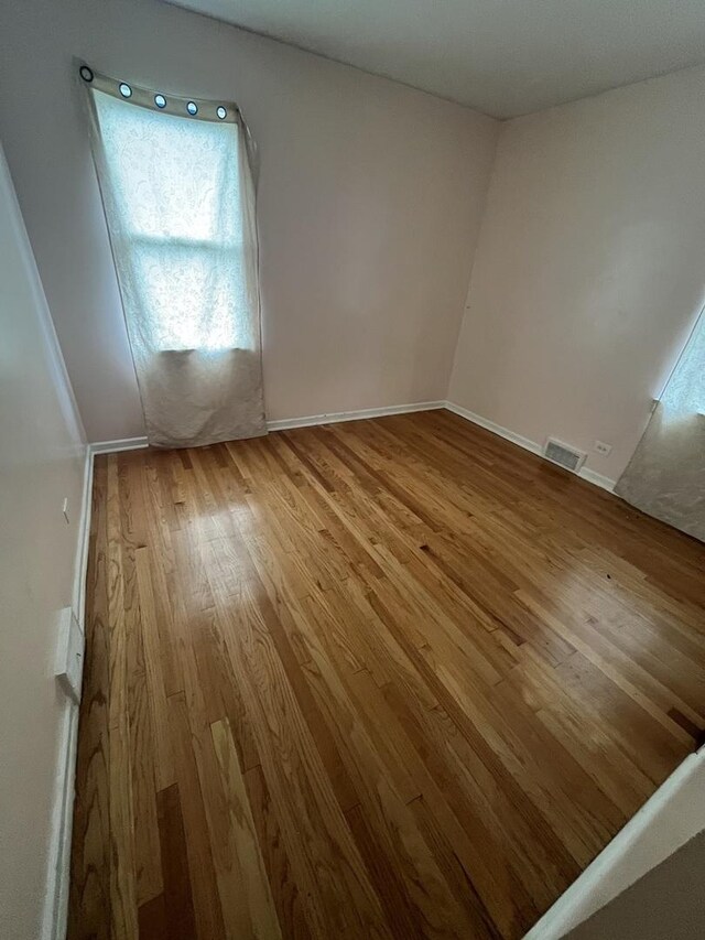 6211 N Harlem Ave, Chicago, IL 60631 - spare room featuring hardwood / wood-style floors and baseboards