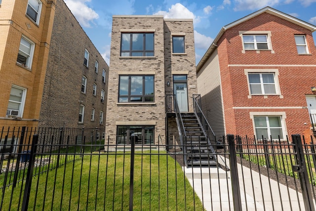 2708 W Jackson Blvd, Chicago, IL 60612 - view of building exterior featuring a fenced front yard
