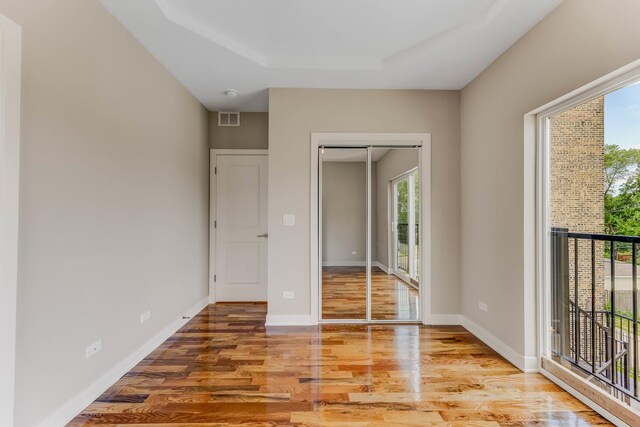 2708 W Jackson Blvd, Chicago, IL 60612 - unfurnished bedroom featuring access to outside and wood finished floors