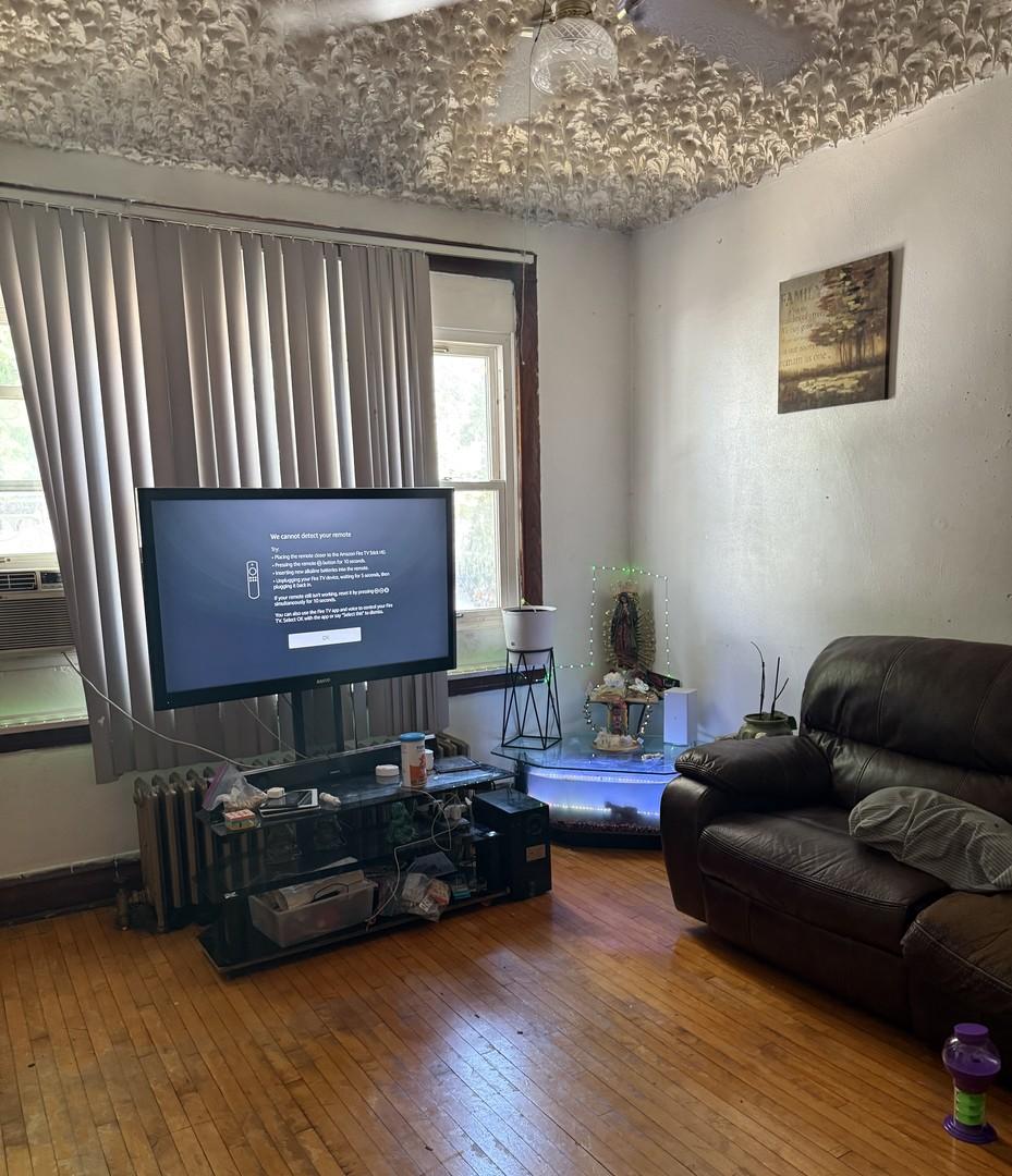 5130 S Whipple St, Chicago, IL 60632 - living room with hardwood / wood-style floors