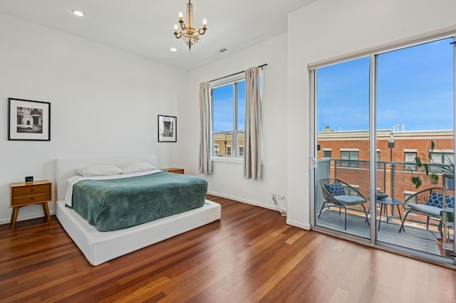 1719 N Western Ave Unit 4, Chicago, IL 60647 - bedroom with a chandelier, wood finished floors, access to exterior, and recessed lighting