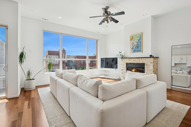 1719 N Western Ave Unit 4, Chicago, IL 60647 - living area with wood finished floors, ceiling fan, a fireplace, and recessed lighting