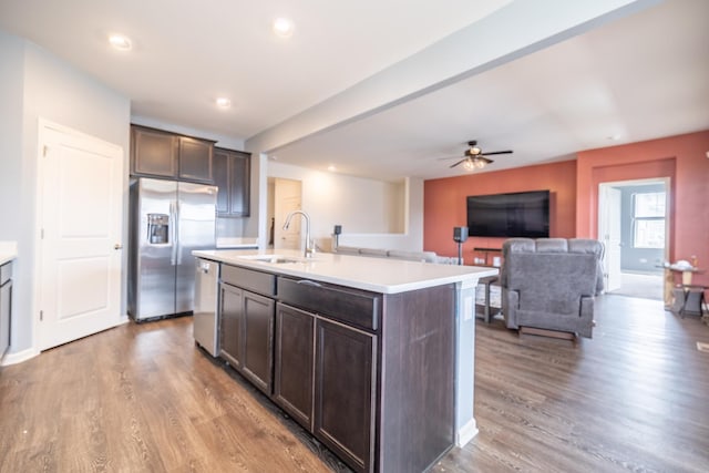738 Kentshire Cir, Elgin, IL 60124 - kitchen featuring appliances with stainless steel finishes, wood finished floors, dark brown cabinetry, light countertops, and recessed lighting