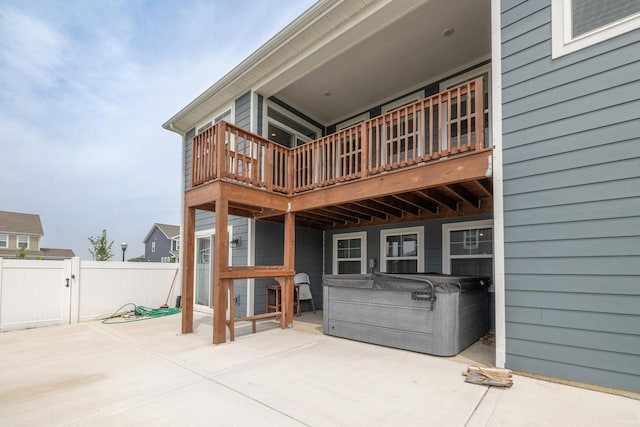 738 Kentshire Cir, Elgin, IL 60124 - rear view of property featuring a hot tub, a patio area, a gate, and a deck