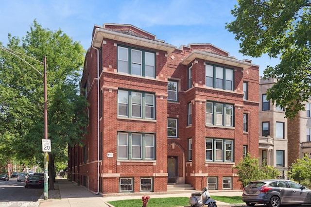 2305 N Kimball Ave Unit 1, Chicago, IL 60647 - view of front of home featuring brick siding