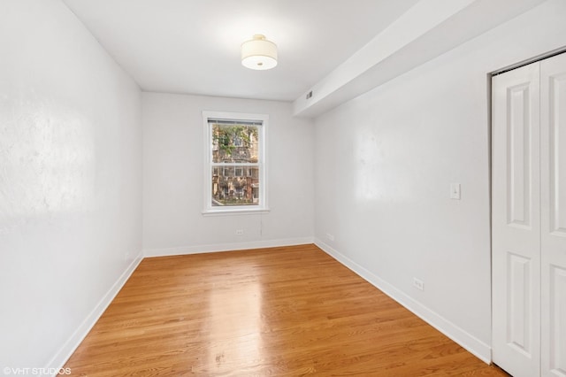 2305 N Kimball Ave Unit 1, Chicago, IL 60647 - unfurnished room featuring light wood finished floors and baseboards