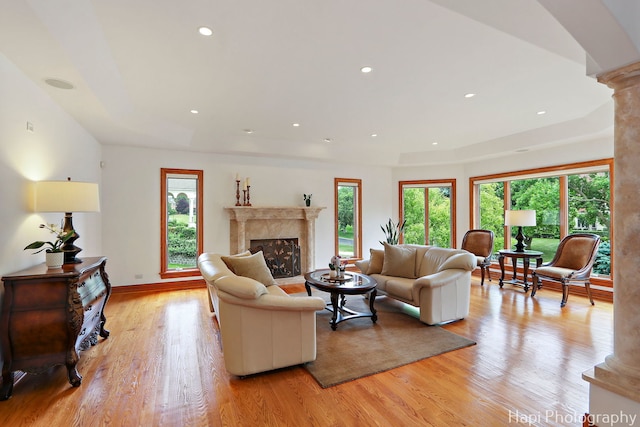 39 Forest Ln, South Barrington, IL 60010 - living room with ornate columns, healthy amount of natural light, a high end fireplace, light wood-type flooring, and recessed lighting