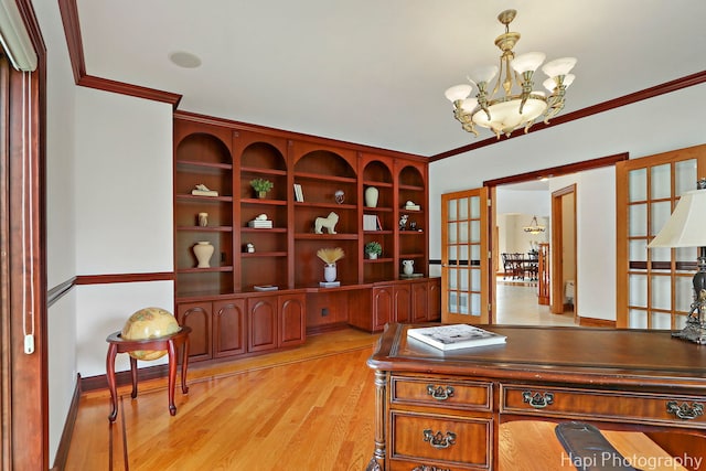 39 Forest Ln, South Barrington, IL 60010 - office area with a chandelier, crown molding, light wood finished floors, and french doors