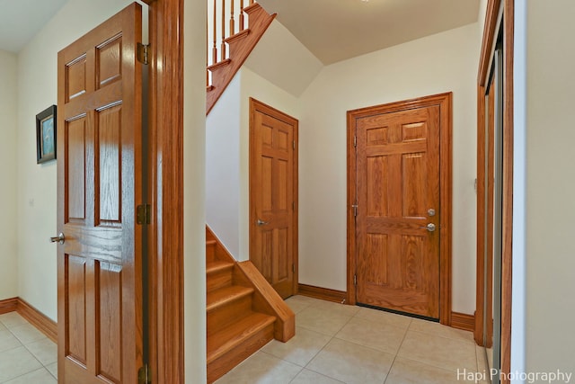 39 Forest Ln, South Barrington, IL 60010 - foyer with light tile patterned floors and stairway