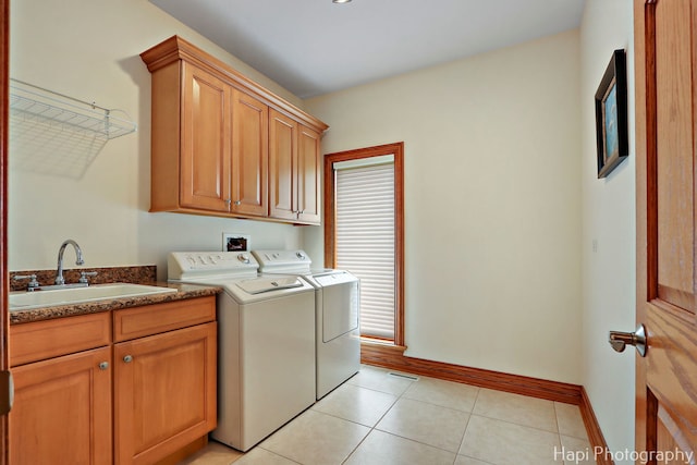 39 Forest Ln, South Barrington, IL 60010 - laundry room with washing machine and dryer, cabinet space, and light tile patterned floors