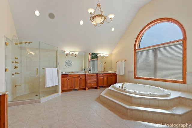 39 Forest Ln, South Barrington, IL 60010 - bathroom with a chandelier, double vanity, a stall shower, a garden tub, and high vaulted ceiling