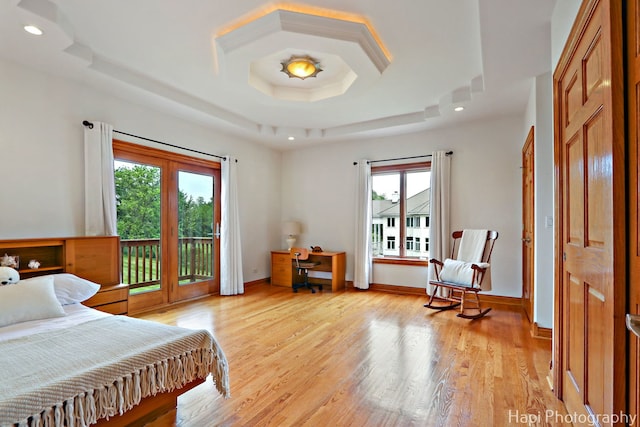 39 Forest Ln, South Barrington, IL 60010 - bedroom featuring multiple windows, access to exterior, light wood-style flooring, recessed lighting, and a raised ceiling