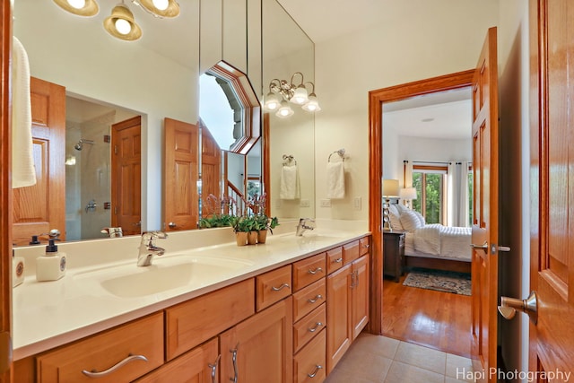 39 Forest Ln, South Barrington, IL 60010 - ensuite bathroom with tile patterned flooring, double vanity, and a shower