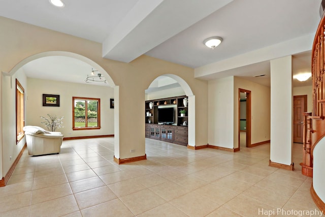 39 Forest Ln, South Barrington, IL 60010 - hallway with light tile patterned flooring, recessed lighting, and arched walkways