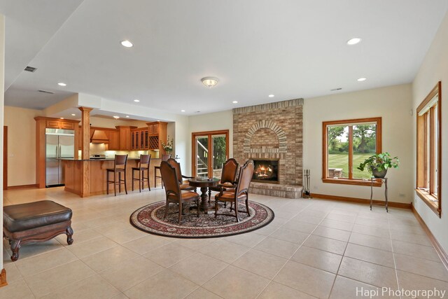 39 Forest Ln, South Barrington, IL 60010 - dining area featuring light tile patterned flooring, recessed lighting, and a brick fireplace