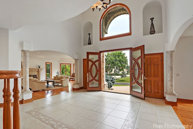 39 Forest Ln, South Barrington, IL 60010 - entrance foyer featuring decorative columns, healthy amount of natural light, and a towering ceiling