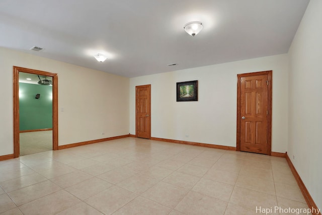 39 Forest Ln, South Barrington, IL 60010 - unfurnished room featuring baseboards and light tile patterned floors