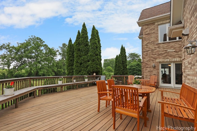 39 Forest Ln, South Barrington, IL 60010 - wooden terrace featuring outdoor dining area and view of wooded area