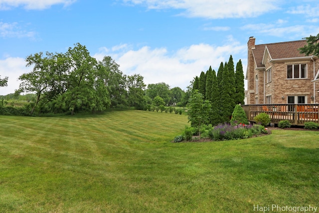 39 Forest Ln, South Barrington, IL 60010 - view of green lawn with a wooden deck