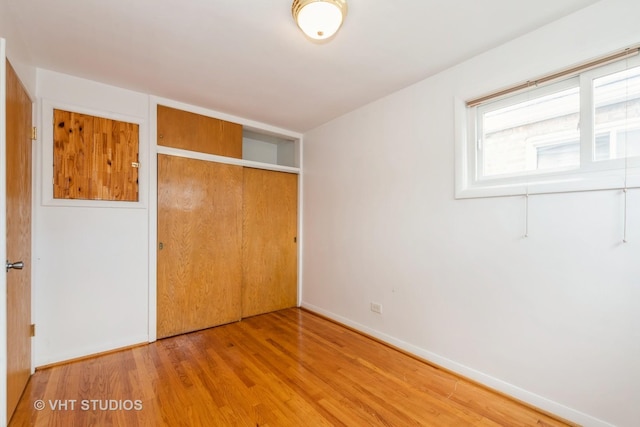 4912 W 32nd St, Cicero, IL 60804 - unfurnished bedroom featuring light wood-style flooring and a closet