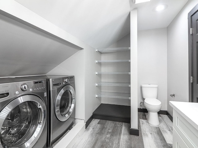 246 S Oak St, Itasca, IL 60143 - laundry area with washer and clothes dryer and wood finished floors
