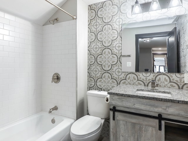 246 S Oak St, Itasca, IL 60143 - full bathroom featuring  shower combination, vanity, lofted ceiling, and tasteful backsplash