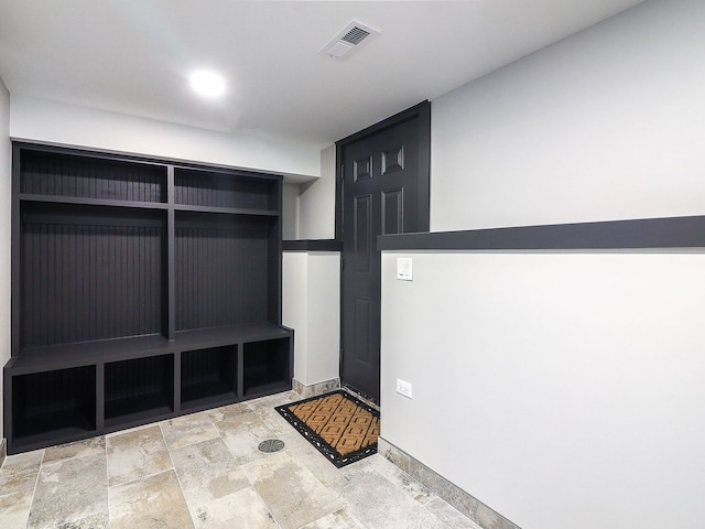 246 S Oak St, Itasca, IL 60143 - mudroom featuring stone finish floors and baseboards