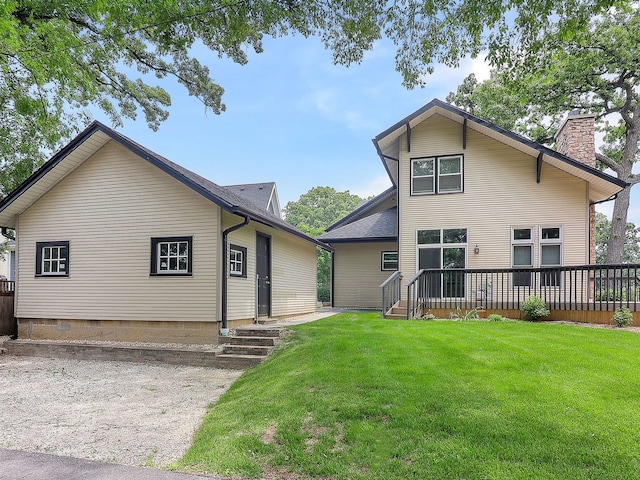 246 S Oak St, Itasca, IL 60143 - view of front of home featuring a front lawn and a chimney