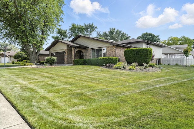 12449 W Prairie Dr, Homer Glen, IL 60491 - view of front facade with brick siding and a garage