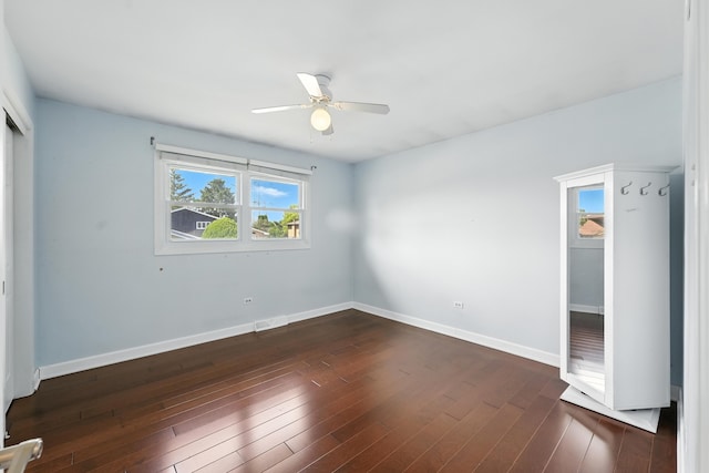 12449 W Prairie Dr, Homer Glen, IL 60491 - unfurnished bedroom with a closet, dark wood-style floors, and ceiling fan