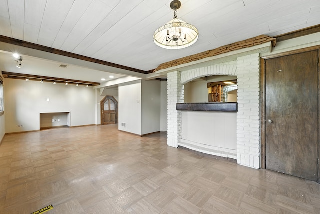 12449 W Prairie Dr, Homer Glen, IL 60491 - unfurnished living room featuring ornate columns, beamed ceiling, and recessed lighting