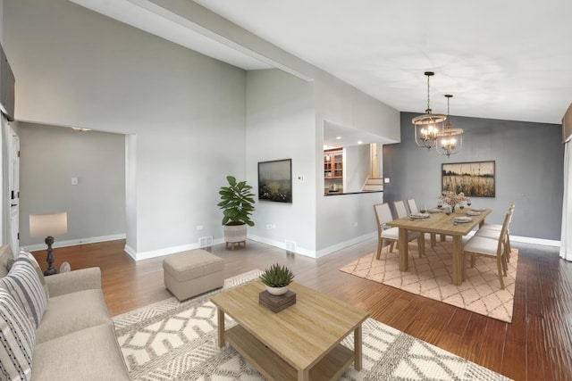 12449 W Prairie Dr, Homer Glen, IL 60491 - living room with vaulted ceiling, a chandelier, wood finished floors, and stairway