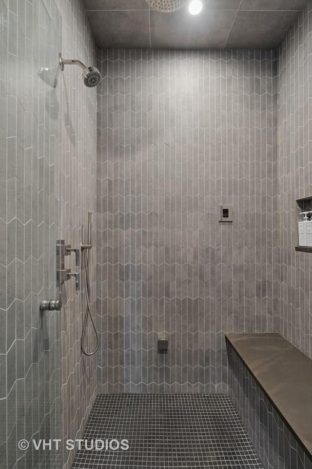 2724 N Wayne Ave Unit 3, Chicago, IL 60614 - bathroom featuring tiled shower, tile walls, and tile patterned flooring