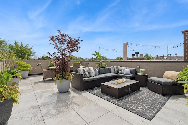 2724 N Wayne Ave Unit 3, Chicago, IL 60614 - view of patio featuring an outdoor living space with a fire pit