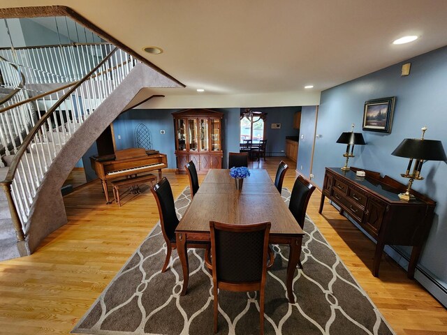 501 Kingston Blvd, Mchenry, IL 60050 - kitchen with high quality appliances, wall chimney range hood, ceiling fan, light brown cabinetry, and ornamental molding