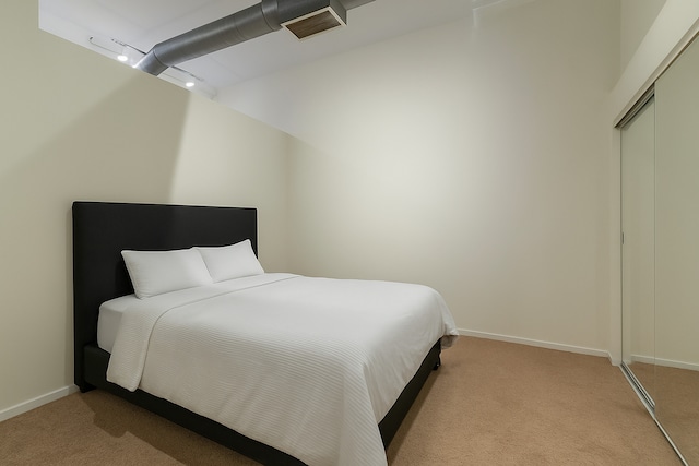 130 S Canal St Unit 624, Chicago, IL 60606 - bedroom with light carpet and a closet