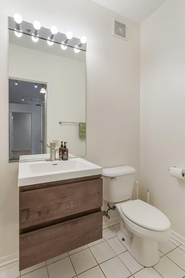 130 S Canal St Unit 624, Chicago, IL 60606 - half bathroom with vanity and tile patterned flooring